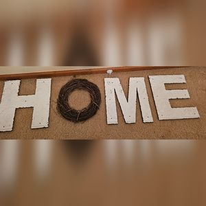 "HOME tiles and wreath